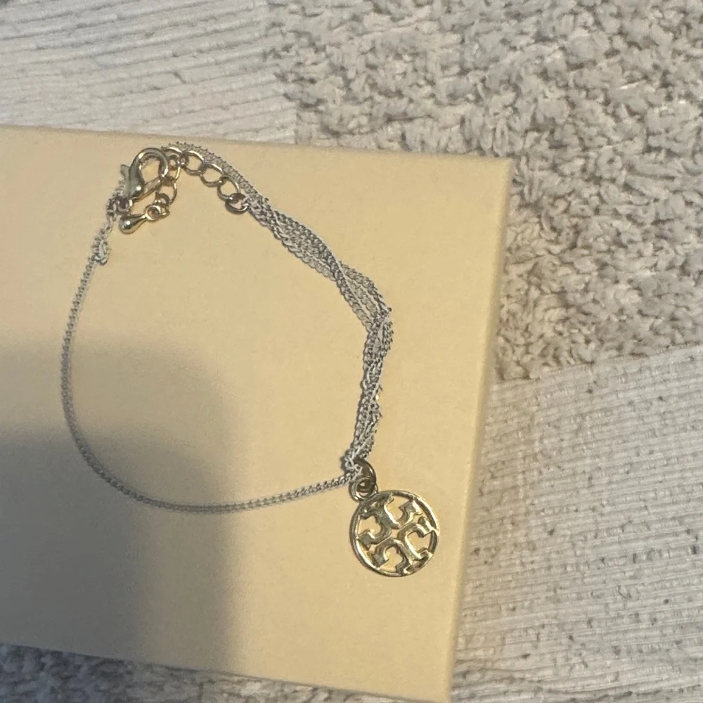 Tory Burch Gold white twisted bracelet - Picture 2 of 4